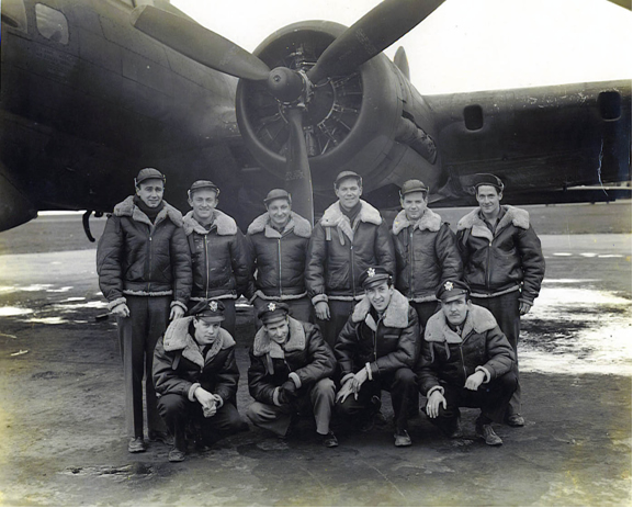 first crew to bomb Berlin posing in front of aircraft